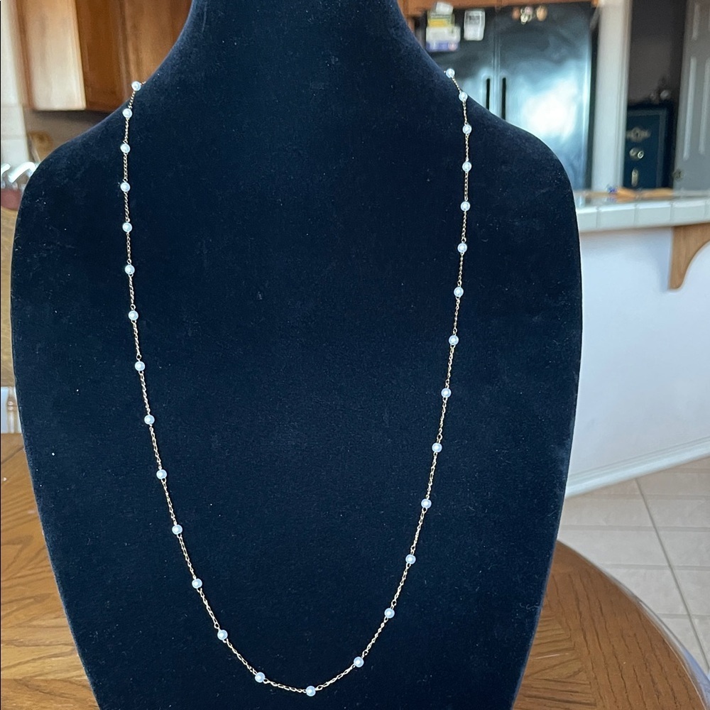 Elegant Gold and White Beaded Necklace